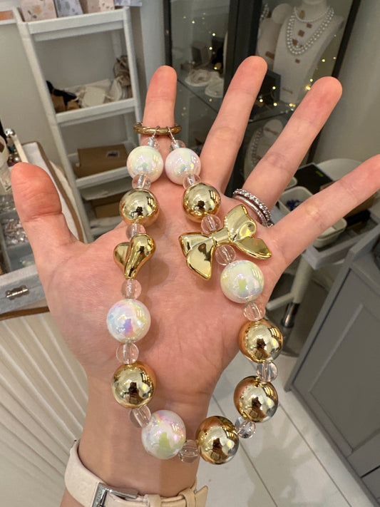 Phone charm gold color