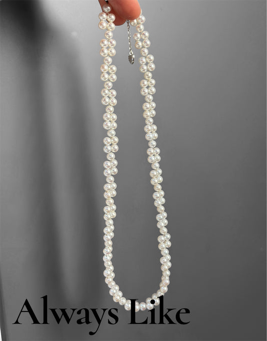 Braided pearl necklace